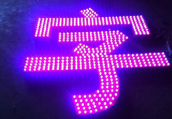 天台外露发光字制作过程及特点。